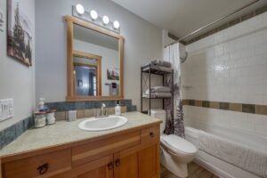 Bright 4 piece Main Bath, right across from the spare bedroom.