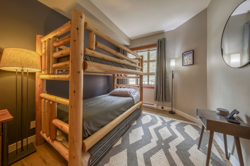 3 Twin beds, even the adults will want! 3’rd twin bed is a trundle bed that fits nicely out of the way under the bunk bed during the day. Lot’s of room and storage.