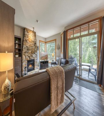 Oversized windows with views of nature in a Park like setting.