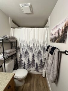 Turn the main bath into a private ensuite with the second bedroom. Pocket door in hallway provides private access between second Bedroom and Main bath.