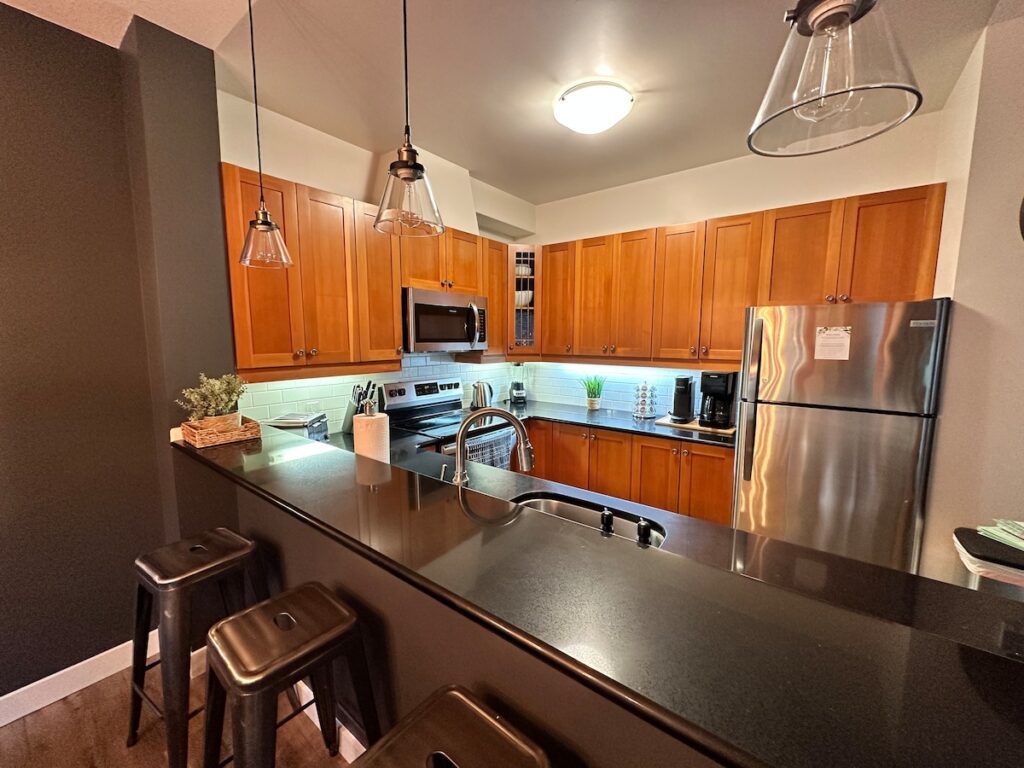 Breakfast bar seats an additional 4 people in the dining room